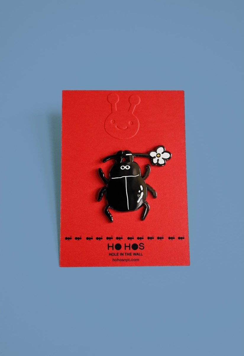 Beetle enamel pin